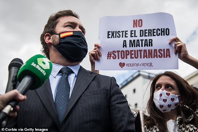 The deputy of the VOX conservative party, Espinosa de los Monteros, gives his support to the demonstration against the euthanasia law in front of the Congress of Deputies in Madrid