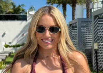 Controversial tennis star spills out of bikini days after flirting row as fans gush 'most beautiful player in the world'