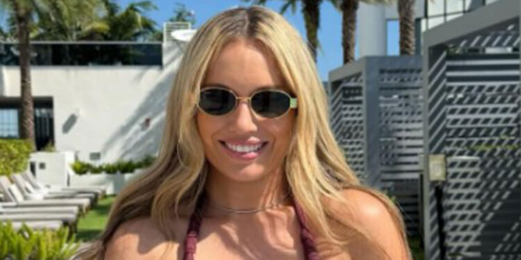 Controversial tennis star spills out of bikini days after flirting row as fans gush 'most beautiful player in the world'