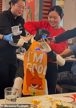 A total of three employees were forced to intervene, grabbing the robot by the scruff of its neck