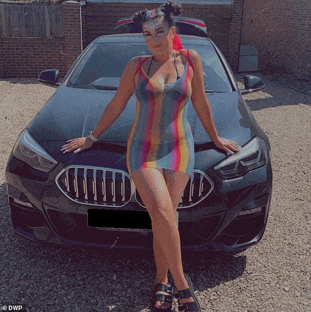 Wieland poses in front of a BMW saloon car she obtained under the Motability programme before attending a festival