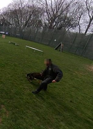 He clamped his jaws around the man's arm - which was fortunately covered by a protective suit