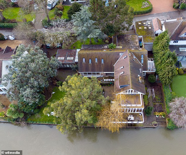 Photos show Rolf Harris' former mansion in Bray, Berkshire, covered in moss with some of the walls decaying