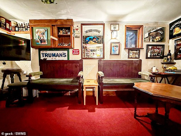 Alcohol branded beer mats and posters line the walls