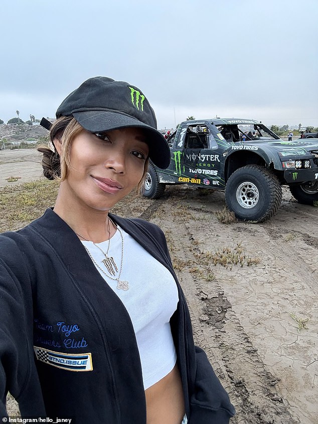 Lee is pictured in front of one of the Monster Energy cars ahead of the San Felipe 250