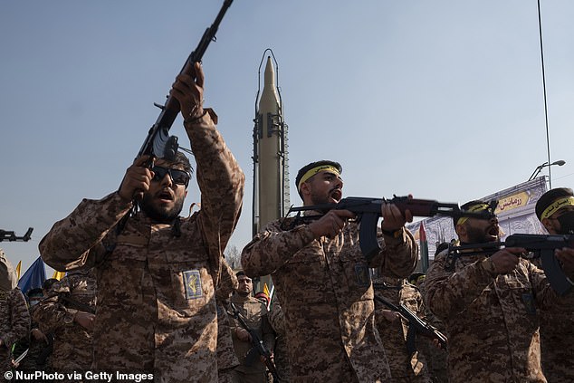 The IRGC numbers around 190,000, and several million men in the reserves have military training (Pictured: IRGC troops)