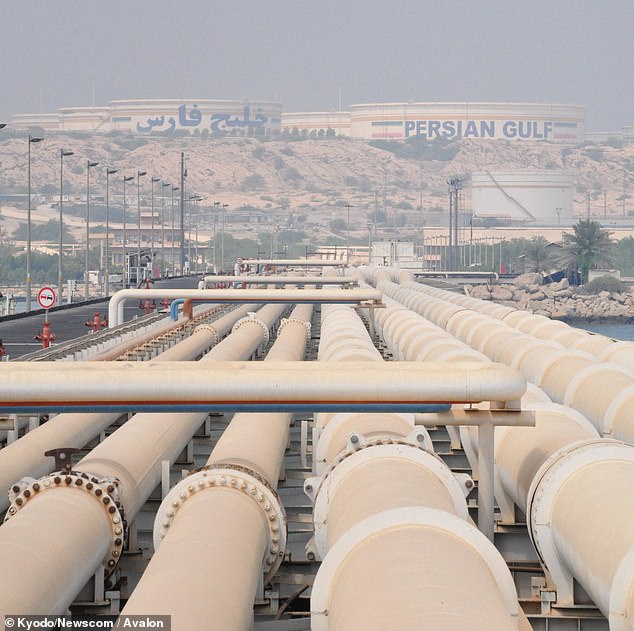 Pipelines transferring crude oil from storages on the hills to tankers in the eastern dock of Kharg Island, Iran