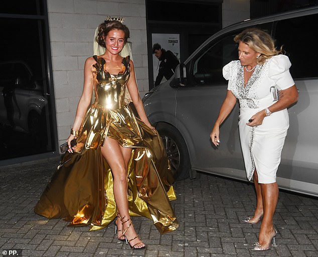 Venezuela glistened in her vibrant hen do dress as she turned heads while entering the lively bash