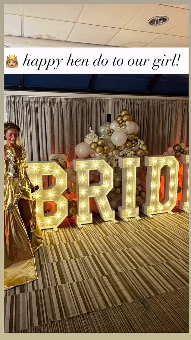 Venezuela posed with a huge lit up bride sign as she made sure all eyes were on her
