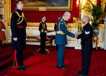 Cop repeatedly stabbed in NECK while trying to save colleagues in ambush by knife-wielding yob gets award
