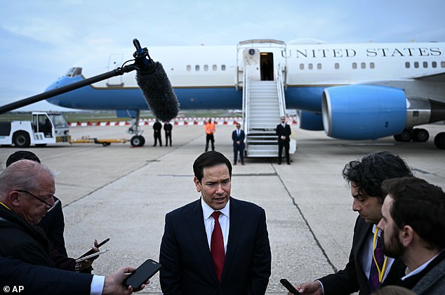 Secretary of State Marco Rubio talks with reporters after meeting his G7 counterparts in France on Friday. He said that ground troops wouldn't be needed in Iran to accomplish the US's objectives, explaining the troop buildup was to give Trump 'maximum optionality'