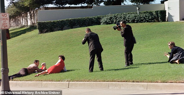 A news crew tries to capture the assassination of President John F Kennedy while a couple and their toddler get down