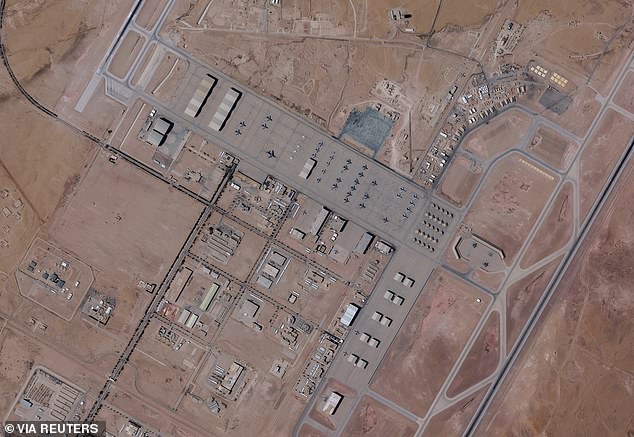 US and Arab officials said the injured soldiers were inside an installation building on the base (pictured), which was hit by at least one missile and several unmanned aerial vehicles