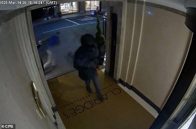 Career criminal Jay McGinty (pictured, on CCTV footage) lobbed smoke grenades into the famous Claridge's hotel in March last year