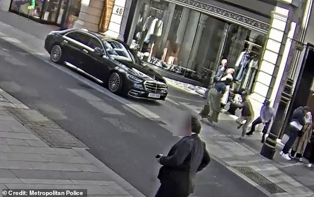 Axel Schwan, chief executive of restaurant chain Tim Hortons, tried to chase down thieves (pictured, on CCTV footage) who snatched his £65,000 Patek Philippe watch in June last year