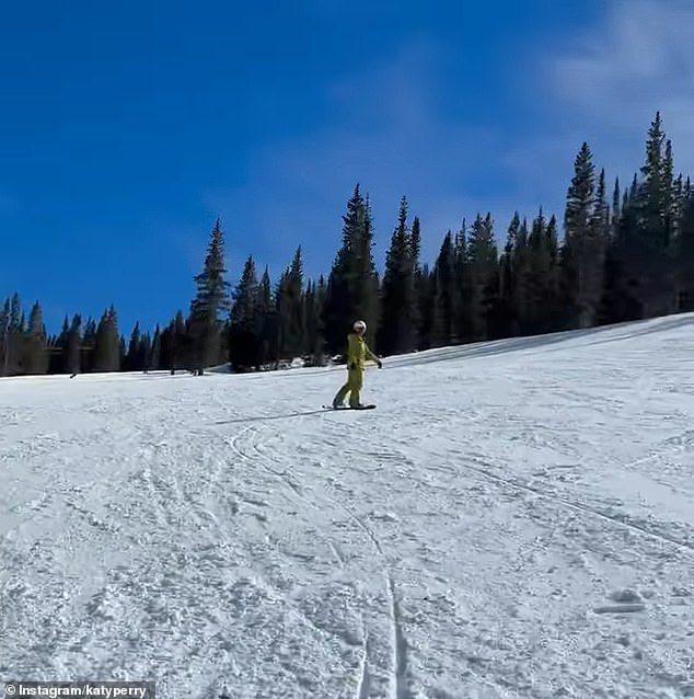 Another person also joined Perry on the slopes, but their identity remained concealed, as she shared a snapshot of the snowboarder wearing lime green attire from a distance
