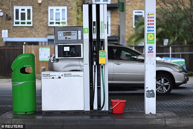 Mr Leighton said it was 'unacceptable' that ministers had the 'gall' to try to smear fuel retailers over the issue. Pictured: An 'out of use' sign on a pump at a petrol station in Bethnal Green, east London, on Friday