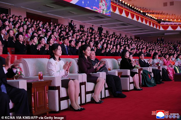 As leader, she would face challenges over her gender in this rigidly patriarchal society. This may explain why Kim Jong-Un (centre right) spoke earlier this month for the first time on International Women's Day and attended a celebratory concert with his wife (centre left) and daughter (centre). Pictured: The family at the performance in Pyongyang