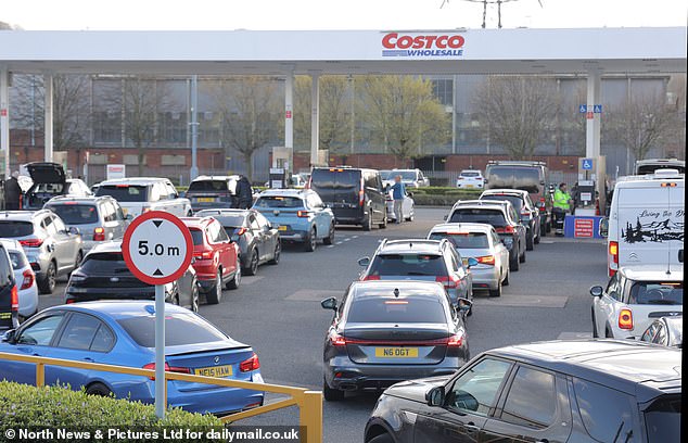 Queues at a branch of CostCo in Gateshead on Friday as customers rushed to take advantage of its cheaper fuel prices