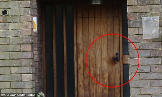 Pictured: The front door of Lakefield Hospitality Training College in Hampstead, has a black fingerprint scanner security system above its handle
