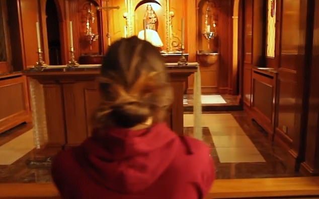 Pictured: A clip from the Ashwell House promotional video showing a student praying - there is no mention of Opus Dei in the video