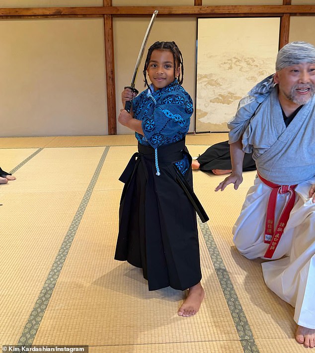 The reality star and her sons posed while holding swords in their hands as they additionally wore samurai outfits