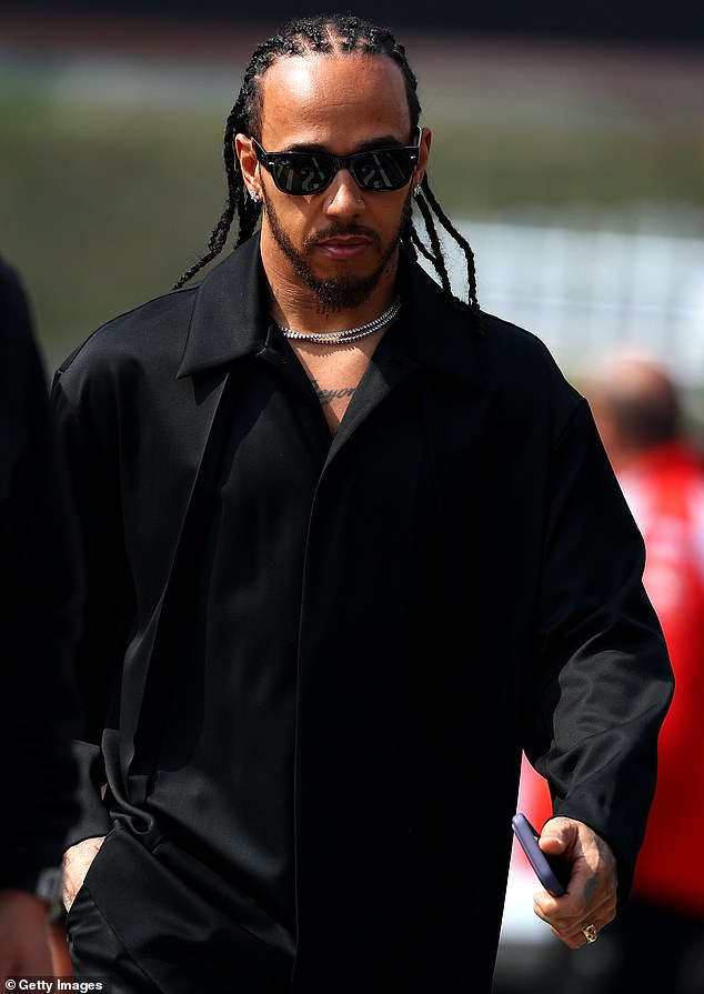 A separate source told People earlier this week that Hamilton is 'just an easygoing guy with great energy. Her family likes him and Kim's very into him'; seen in Japan on March 28