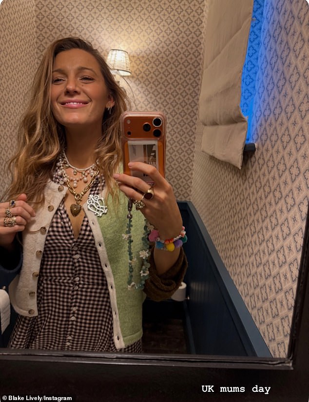 And Blake showed off some of her holiday looks as she posed for a mirror selfie taken on UK Mother's Day as she wore a black and white gingham shirt dress