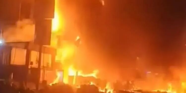 Dramatic moment flames tear through high-rise building in China leaving one dead and 25 injured