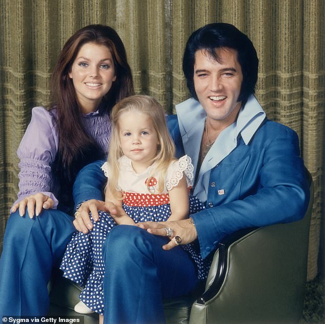 Elvis Presley with his wife Priscilla and their daughter Lisa-Marie, pictured in 1970