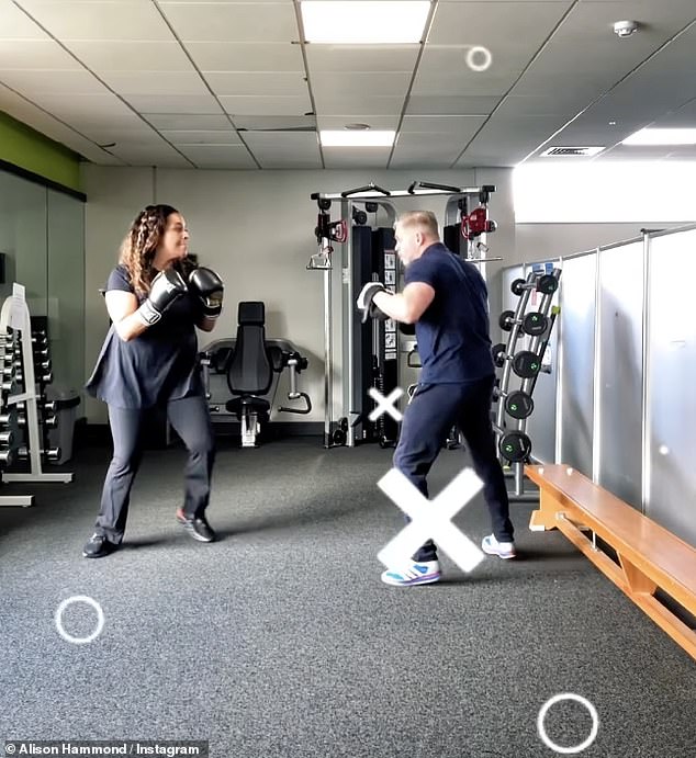 And she showcased her slimmed-down physique in a black activewear set while taking part in a one-on-one training session