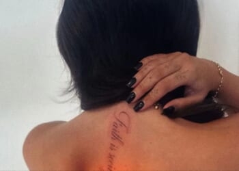 Love Island's Belle Hassan strips topless to show off new tattoo after going official with Harrison