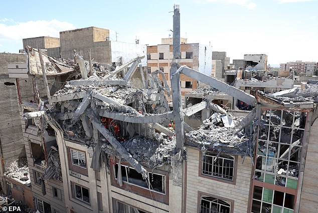 A damaged residential building in southern Tehran on Friday after continued strikes by the US and Israel on March 27, 2026