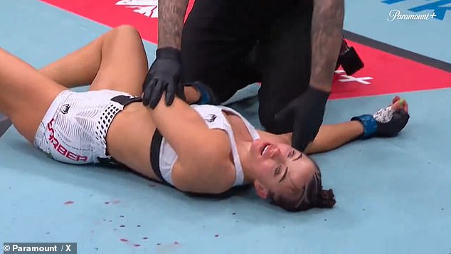 As she laid on her back on the canvas, Barber's eyes were open but she appeared unconscious