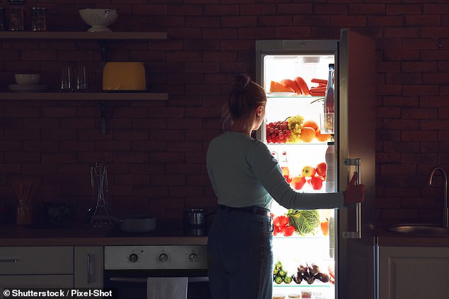 Recent research has found eating late at night increases the risk of cerebrovascular disease and reduces the amount of time spent in REM sleep (stock image)