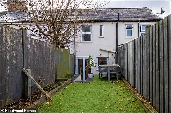 Easy: The property has a low-maintenance back garden with an artificial lawn