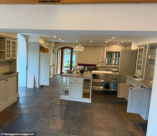 The kitchen area is seen before it was gutted