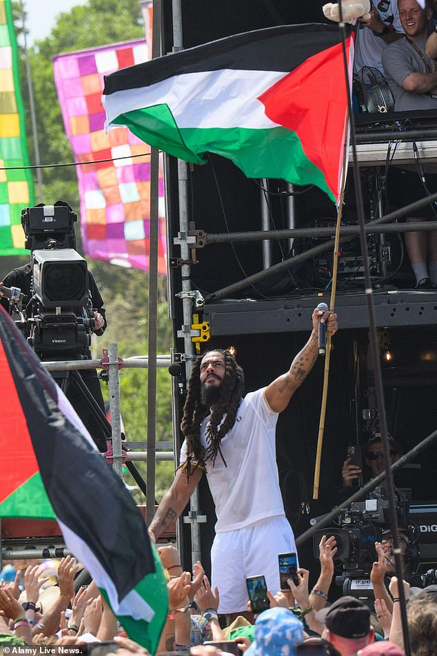 The singer also waved the Palestinian flag during his set at Worthy Farm, Somerset