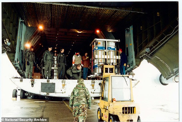 US officials say the potential mission would target roughly 1,000 pounds of enriched uranium stored at multiple Iranian sites. Pictured, a US Air Force C-5 Galaxy being loaded with highly enriched uranium in Kazakhstan as part of Project Sapphire in 1994