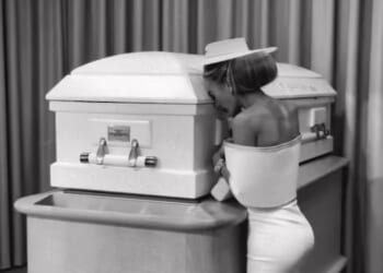 Grieving mum slams trolls who blasted her for posting pic posing next to daughter's coffin at funeral