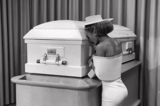 Grieving mum slams trolls who blasted her for posting pic posing next to daughter's coffin at funeral