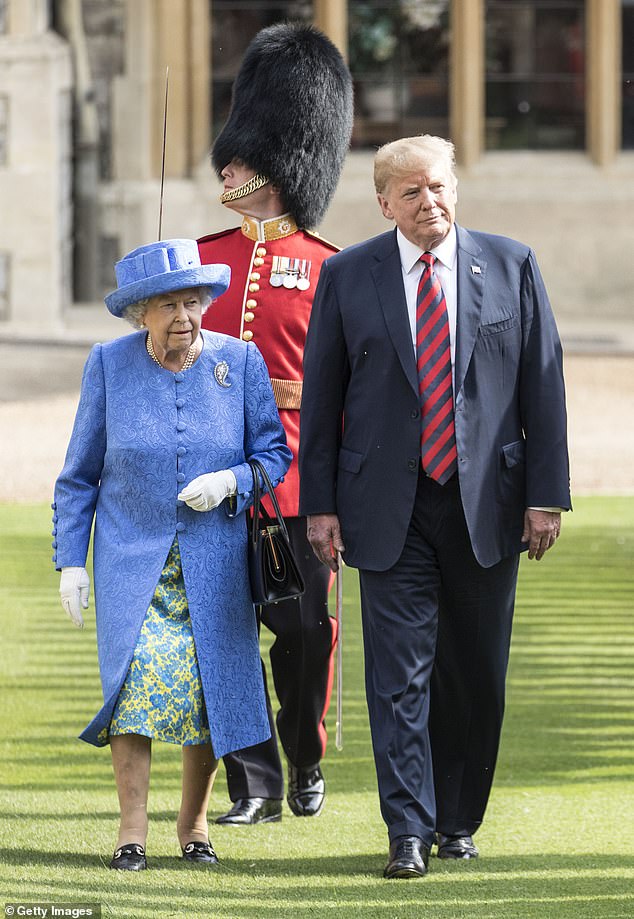 Queen Elizabeth (left) walks alongside President Donald Trump (right) during an arrival ceremony on July 13, 2018 during a working visit to Windsor Castle. Trump later told Page that the Queen wouldn't tell him who her favorite American president was