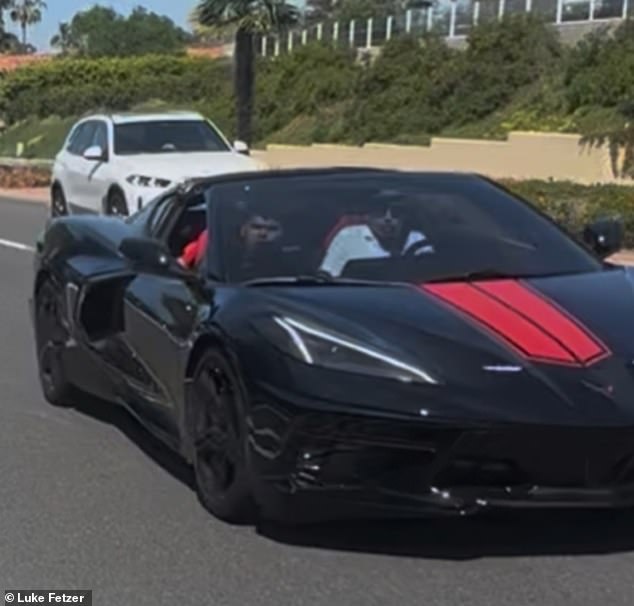 The men said a driver and passenger in a black and red sports car also hurled slurs at them and attempted to harm them