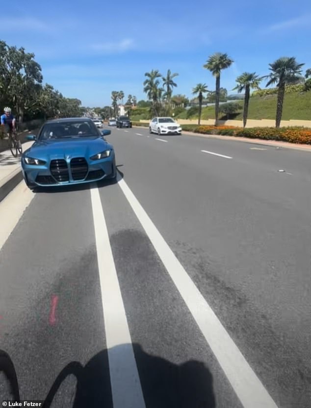 After running Byra off the roadway, the car then sped up and tailed Fetzer in the bike lane before speeding around him