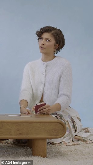 She answered, 'I wouldn¿t say it¿s jealous, but I do think sometimes people, specifically my own person...who can do backflips and sh*t like that'