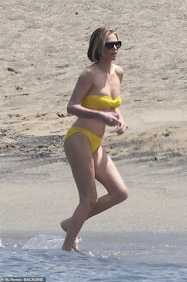 She likely had enough of the chilly water as she headed back to her lounge chair