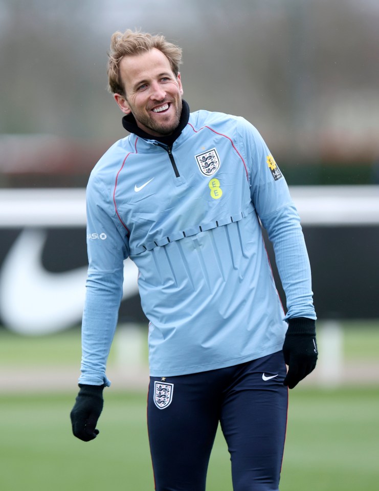 Harry Kane smiling during an England training session.