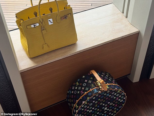 Then there was a photo that surely will make all her female fans drool: Jenner showed off a yellow Hermes Birkin bag and a colorful Louis Vuitton purse