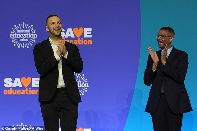 Promising also to abolish Ofsted and overhaul the academies programme, he received more than 10 rounds of applause and as well as a standing ovation at the end (Mr Polanski is pictured here with NEU General Secretary Daniel Kebede)