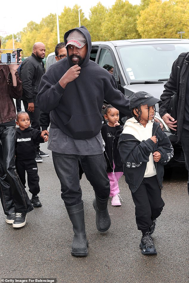 Kanye decided to name the album Bully after learning his ten-year-old son Saint had allegedly kicked a child for being 'weak'. West with sons Saint, Psalm, and daughter Chicago in 2022